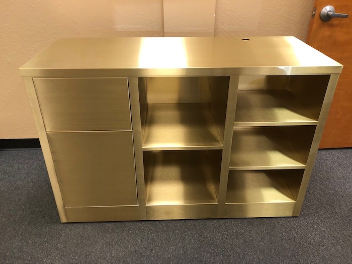 a brass cabinet with a #4 satin finish applied